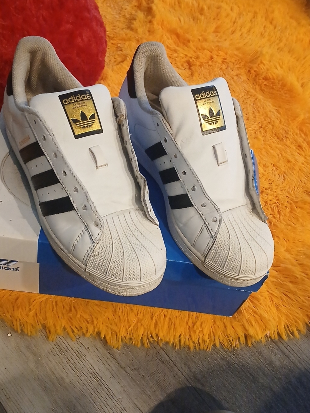 adidas Men's White Superstar Sneakers with Black Stripes